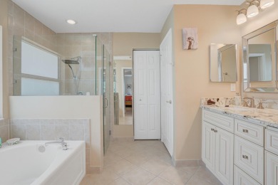 RARELY AVAILABLE EXTENDED GENOVA MODEL SET ON A BEAUTIFUL CANAL on Westchester Golf and Country Club in Florida - for sale on GolfHomes.com, golf home, golf lot