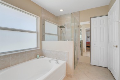 RARELY AVAILABLE EXTENDED GENOVA MODEL SET ON A BEAUTIFUL CANAL on Westchester Golf and Country Club in Florida - for sale on GolfHomes.com, golf home, golf lot