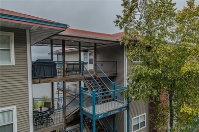 Top-Floor Palisades Condo with Main Channel Views! Enjoy on Tan-Tar-A Golf Club in Missouri - for sale on GolfHomes.com, golf home, golf lot