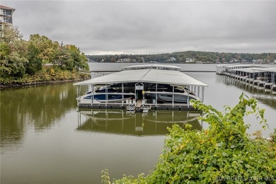 Top-Floor Palisades Condo with Main Channel Views! Enjoy on Tan-Tar-A Golf Club in Missouri - for sale on GolfHomes.com, golf home, golf lot