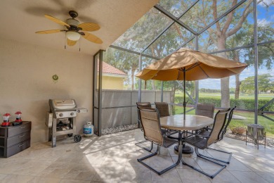 RARELY AVAILABLE EXTENDED GENOVA MODEL SET ON A BEAUTIFUL CANAL on Westchester Golf and Country Club in Florida - for sale on GolfHomes.com, golf home, golf lot