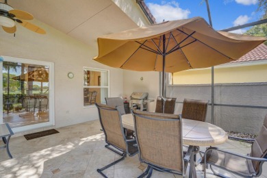 RARELY AVAILABLE EXTENDED GENOVA MODEL SET ON A BEAUTIFUL CANAL on Westchester Golf and Country Club in Florida - for sale on GolfHomes.com, golf home, golf lot
