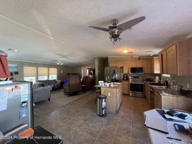 3 bedrooms 2 baths with huge bonusroom ideal for mother in law on High Point Golf Club, Inc. in Florida - for sale on GolfHomes.com, golf home, golf lot