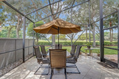 RARELY AVAILABLE EXTENDED GENOVA MODEL SET ON A BEAUTIFUL CANAL on Westchester Golf and Country Club in Florida - for sale on GolfHomes.com, golf home, golf lot
