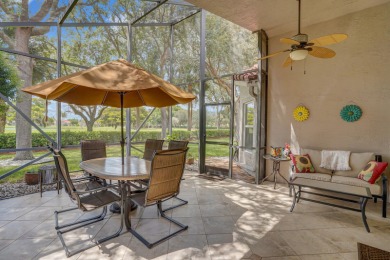 RARELY AVAILABLE EXTENDED GENOVA MODEL SET ON A BEAUTIFUL CANAL on Westchester Golf and Country Club in Florida - for sale on GolfHomes.com, golf home, golf lot