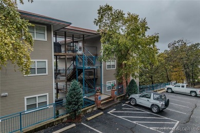 Top-Floor Palisades Condo with Main Channel Views! Enjoy on Tan-Tar-A Golf Club in Missouri - for sale on GolfHomes.com, golf home, golf lot