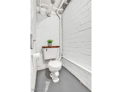 Here's your chance to own two distinctive homes on one on Alliance Country Club in Ohio - for sale on GolfHomes.com, golf home, golf lot