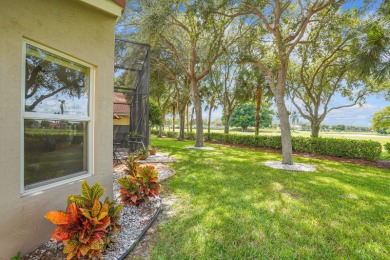 RARELY AVAILABLE EXTENDED GENOVA MODEL SET ON A BEAUTIFUL CANAL on Westchester Golf and Country Club in Florida - for sale on GolfHomes.com, golf home, golf lot
