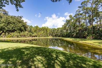 Enjoy Florida living with Palm trees & nature views. The quiet on Plantation Bay Golf and Country Club in Florida - for sale on GolfHomes.com, golf home, golf lot