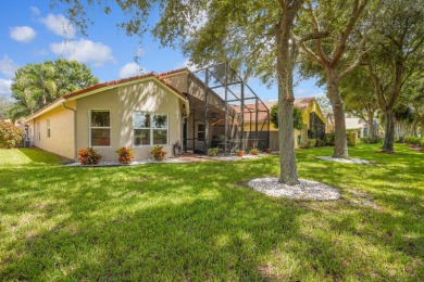 RARELY AVAILABLE EXTENDED GENOVA MODEL SET ON A BEAUTIFUL CANAL on Westchester Golf and Country Club in Florida - for sale on GolfHomes.com, golf home, golf lot