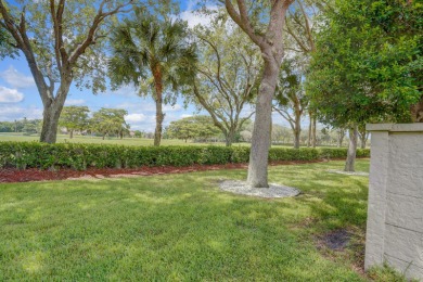 RARELY AVAILABLE EXTENDED GENOVA MODEL SET ON A BEAUTIFUL CANAL on Westchester Golf and Country Club in Florida - for sale on GolfHomes.com, golf home, golf lot