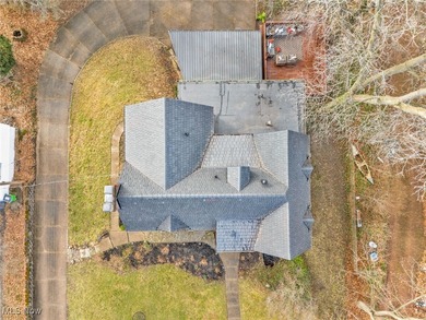 Here's your chance to own two distinctive homes on one on Alliance Country Club in Ohio - for sale on GolfHomes.com, golf home, golf lot