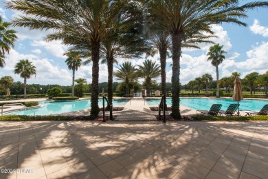 Enjoy Florida living with Palm trees & nature views. The quiet on Plantation Bay Golf and Country Club in Florida - for sale on GolfHomes.com, golf home, golf lot