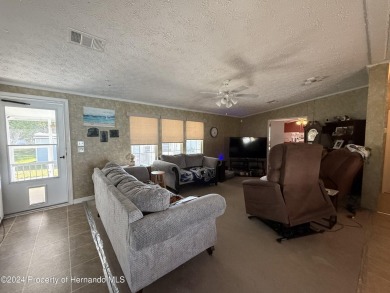 3 bedrooms 2 baths with huge bonusroom ideal for mother in law on High Point Golf Club, Inc. in Florida - for sale on GolfHomes.com, golf home, golf lot