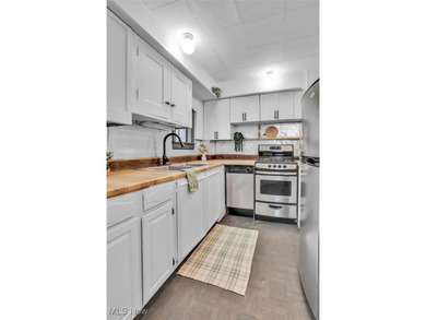 Here's your chance to own two distinctive homes on one on Alliance Country Club in Ohio - for sale on GolfHomes.com, golf home, golf lot