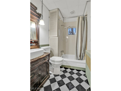 Here's your chance to own two distinctive homes on one on Alliance Country Club in Ohio - for sale on GolfHomes.com, golf home, golf lot