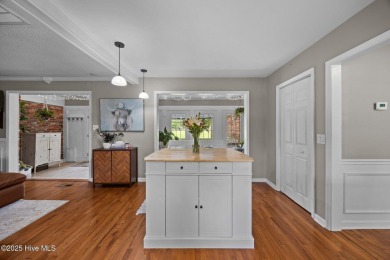 Discover this inviting brick ranch nestled on a serene .48-acre on River Bend Golf and Country Club in North Carolina - for sale on GolfHomes.com, golf home, golf lot