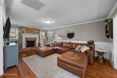 Discover this inviting brick ranch nestled on a serene .48-acre on River Bend Golf and Country Club in North Carolina - for sale on GolfHomes.com, golf home, golf lot