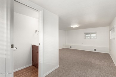 This ''Stick built'', 1 bed, 1 1/2 bath home is large enough for on Great Eagle Golf Club in Arizona - for sale on GolfHomes.com, golf home, golf lot