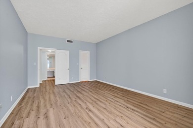 SPACIOUS ONE BEDROOM CONDO WITH ONE FULL BATH & ONE-HALF BATH on BallenIsles Golf and Country Club in Florida - for sale on GolfHomes.com, golf home, golf lot