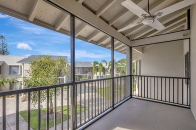 SPACIOUS ONE BEDROOM CONDO WITH ONE FULL BATH & ONE-HALF BATH on BallenIsles Golf and Country Club in Florida - for sale on GolfHomes.com, golf home, golf lot