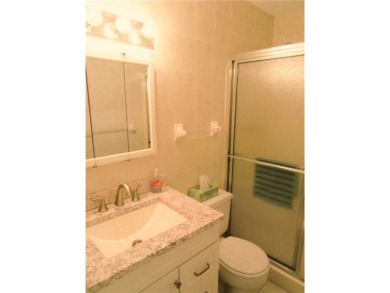 Ideal Florida living value priced and offered turnkey! Beautiful on The American Golf Club in Florida - for sale on GolfHomes.com, golf home, golf lot