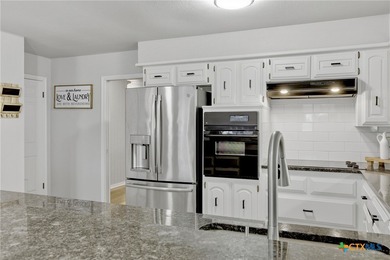 Nestled along the Mill Creek Golf Course, this beautifully on Mill Creek Golf Club in Texas - for sale on GolfHomes.com, golf home, golf lot