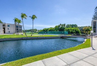 SPACIOUS ONE BEDROOM CONDO WITH ONE FULL BATH & ONE-HALF BATH on BallenIsles Golf and Country Club in Florida - for sale on GolfHomes.com, golf home, golf lot