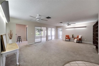 This spacious 2,040 sq ft, 3-bedroom, 2-bathroom single-level on North Lakes Golf Course in Florida - for sale on GolfHomes.com, golf home, golf lot