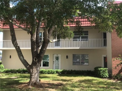 Ideal Florida living value priced and offered turnkey! Beautiful on The American Golf Club in Florida - for sale on GolfHomes.com, golf home, golf lot