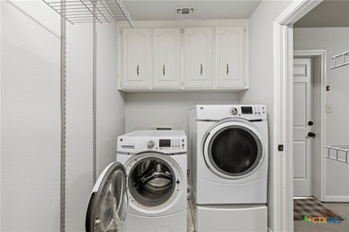 Nestled along the Mill Creek Golf Course, this beautifully on Mill Creek Golf Club in Texas - for sale on GolfHomes.com, golf home, golf lot