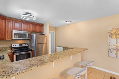 Live the Floirda lifestyle in this stunning 2 Bed/ 2 bath, fully on The American Golf Club in Florida - for sale on GolfHomes.com, golf home, golf lot