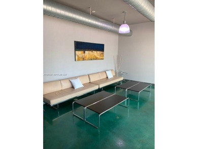 BEAUTIFUL LOFT WITH A FLOW THROUGH FLOOR PLAN IN VERY DESIRABLE on Turnberry Isle Resort and Club in Florida - for sale on GolfHomes.com, golf home, golf lot