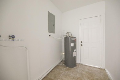 NEW ROOF. Welcome to 2063 NE 173rd ST. Your home to renovate in on Greynolds Park Golf Course in Florida - for sale on GolfHomes.com, golf home, golf lot