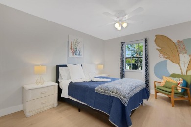 Step inside this meticulously kept, three bedroom, two and a on Baypoint Golf Club in Florida - for sale on GolfHomes.com, golf home, golf lot