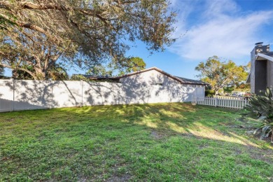 Step inside this meticulously kept, three bedroom, two and a on Baypoint Golf Club in Florida - for sale on GolfHomes.com, golf home, golf lot