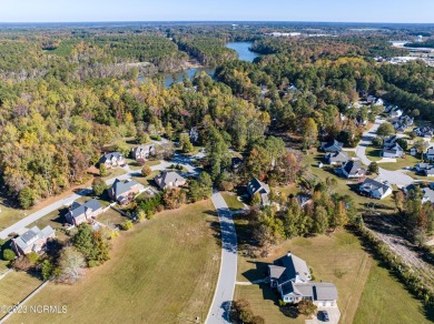 Discover an extraordinary opportunity to build your dream home on The Golf Club At Rocky Mount in North Carolina - for sale on GolfHomes.com, golf home, golf lot