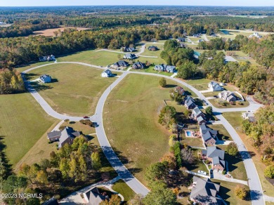 Discover an extraordinary opportunity to build your dream home on The Golf Club At Rocky Mount in North Carolina - for sale on GolfHomes.com, golf home, golf lot