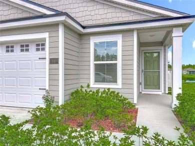 This nearly NEW 3-bedroom, 2-bath Berkeley floorplan offers 1 on Grand Reserve Golf Course in Florida - for sale on GolfHomes.com, golf home, golf lot