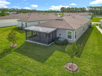 This nearly NEW 3-bedroom, 2-bath Berkeley floorplan offers 1 on Grand Reserve Golf Course in Florida - for sale on GolfHomes.com, golf home, golf lot