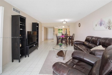 Beautifully renovated 2-bed, 2-bath condo with a modern on Palm-Aire Country Club and Resort - The Oaks in Florida - for sale on GolfHomes.com, golf home, golf lot