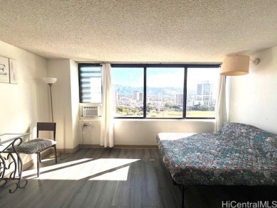 The airy and bright unit overlooking the canal and Ala Wai Golf on Ala Wai Golf Course in Hawaii - for sale on GolfHomes.com, golf home, golf lot
