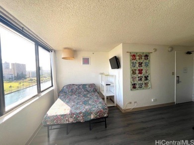 The airy and bright unit overlooking the canal and Ala Wai Golf on Ala Wai Golf Course in Hawaii - for sale on GolfHomes.com, golf home, golf lot