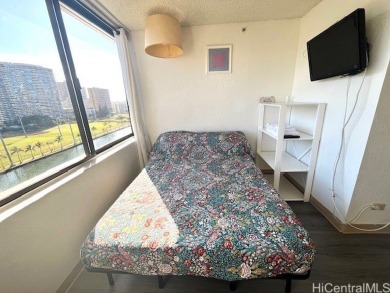 The airy and bright unit overlooking the canal and Ala Wai Golf on Ala Wai Golf Course in Hawaii - for sale on GolfHomes.com, golf home, golf lot