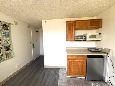 The airy and bright unit overlooking the canal and Ala Wai Golf on Ala Wai Golf Course in Hawaii - for sale on GolfHomes.com, golf home, golf lot