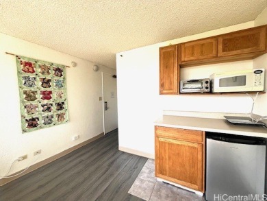 The airy and bright unit overlooking the canal and Ala Wai Golf on Ala Wai Golf Course in Hawaii - for sale on GolfHomes.com, golf home, golf lot