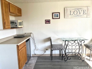 The airy and bright unit overlooking the canal and Ala Wai Golf on Ala Wai Golf Course in Hawaii - for sale on GolfHomes.com, golf home, golf lot