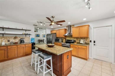 Welcome to Your Dream Home at 24548 Calusa Blvd! Discover the on Black Bear Golf Club in Florida - for sale on GolfHomes.com, golf home, golf lot