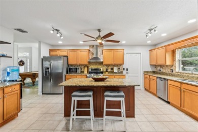 Welcome to Your Dream Home at 24548 Calusa Blvd! Discover the on Black Bear Golf Club in Florida - for sale on GolfHomes.com, golf home, golf lot