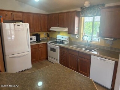 Newer Cavco 2006 home with many updates! Newer solid surface on Tucson Estates Golf Course in Arizona - for sale on GolfHomes.com, golf home, golf lot